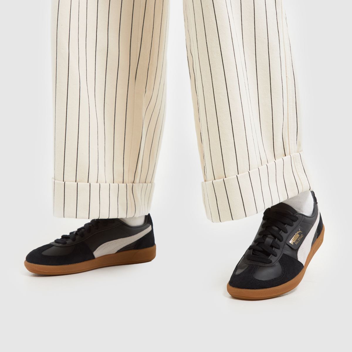 PUMA Palermo lädersneakers i svart och vitt