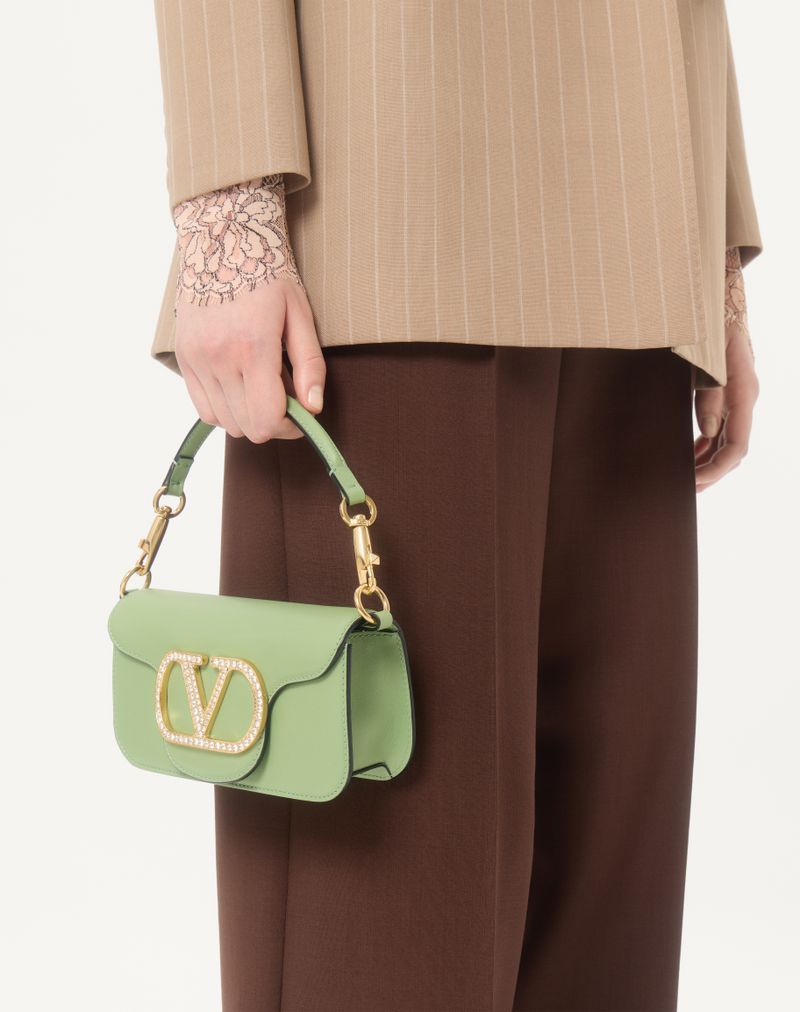 Bolsa de ombro pequena Valentino Garavani Locò com logotipo de joia