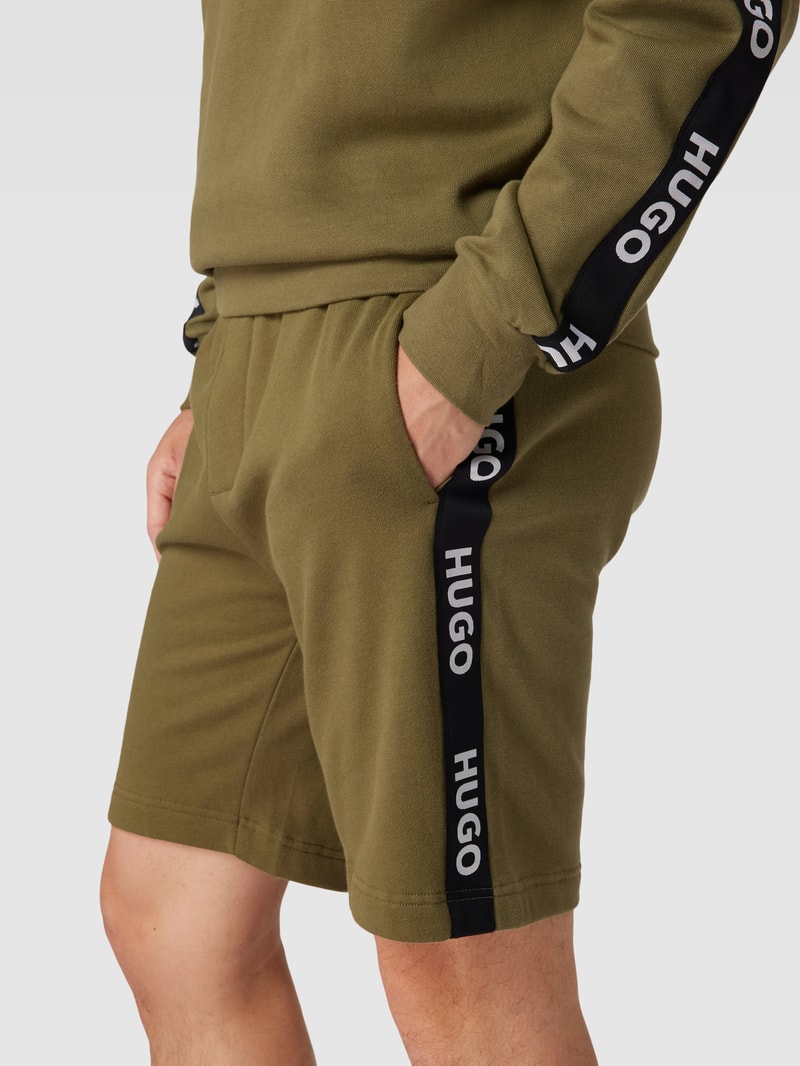 Sweatshorts mit Logo-Details Modell 'Sporty' in olivgrün