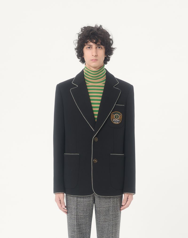 Valentino wollen jas met enkele rij knopen en Valentino-patch