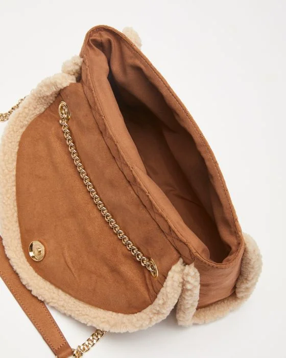 Sac matelassé finition moutonnée