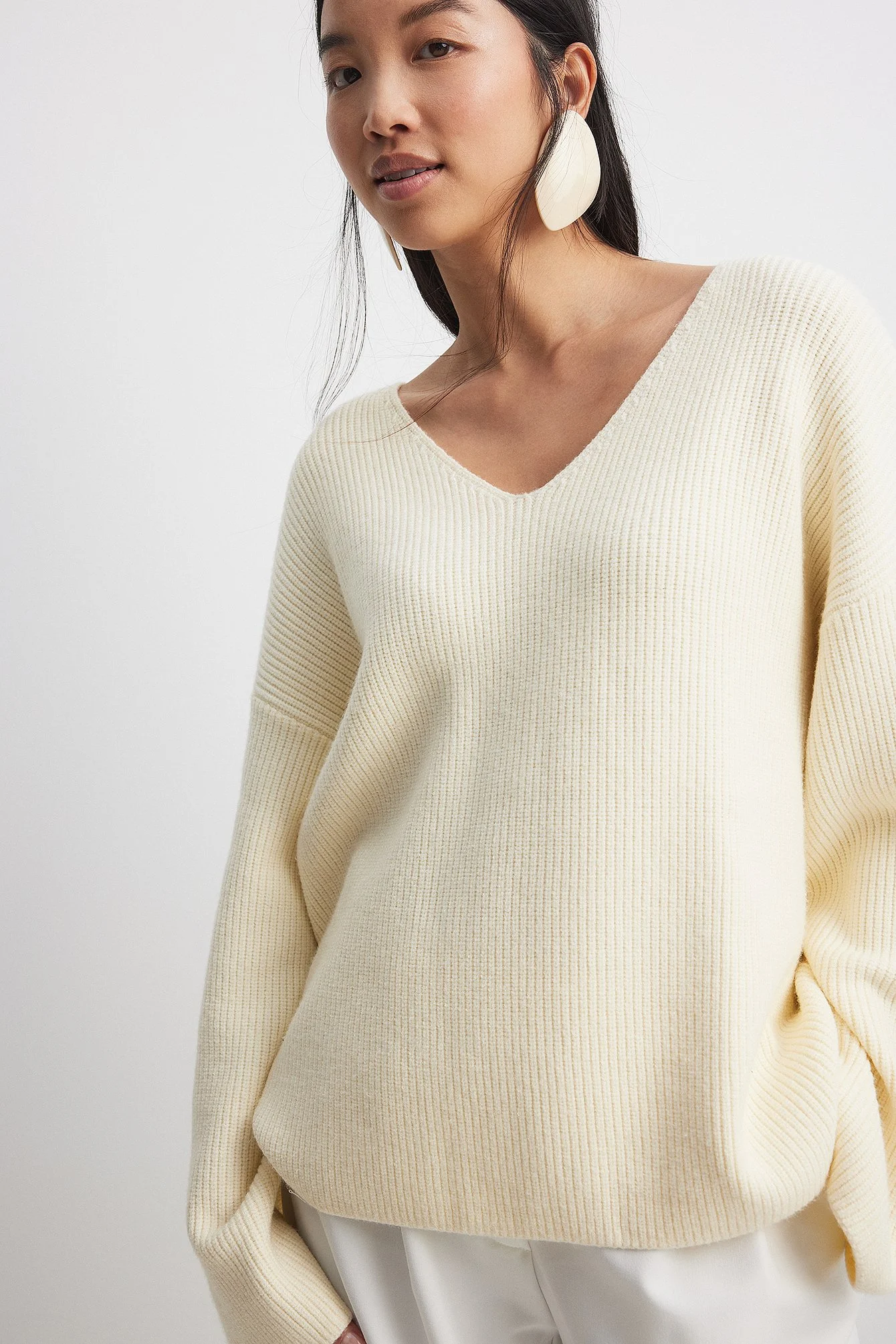 V-Ausschnitt Strickpullover