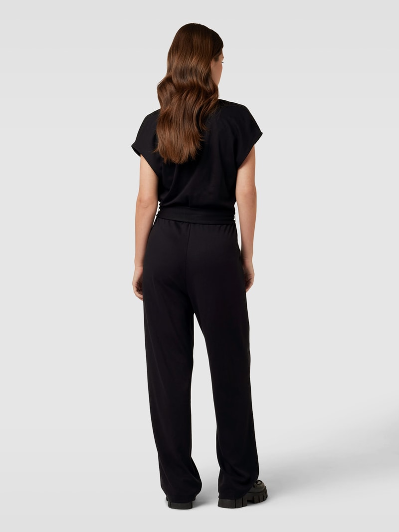 Jumpsuit in Wickel-Optik mit Bindegürtel in schwarz