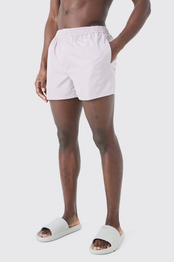 Kurze Badehose mit Druckknöpfen