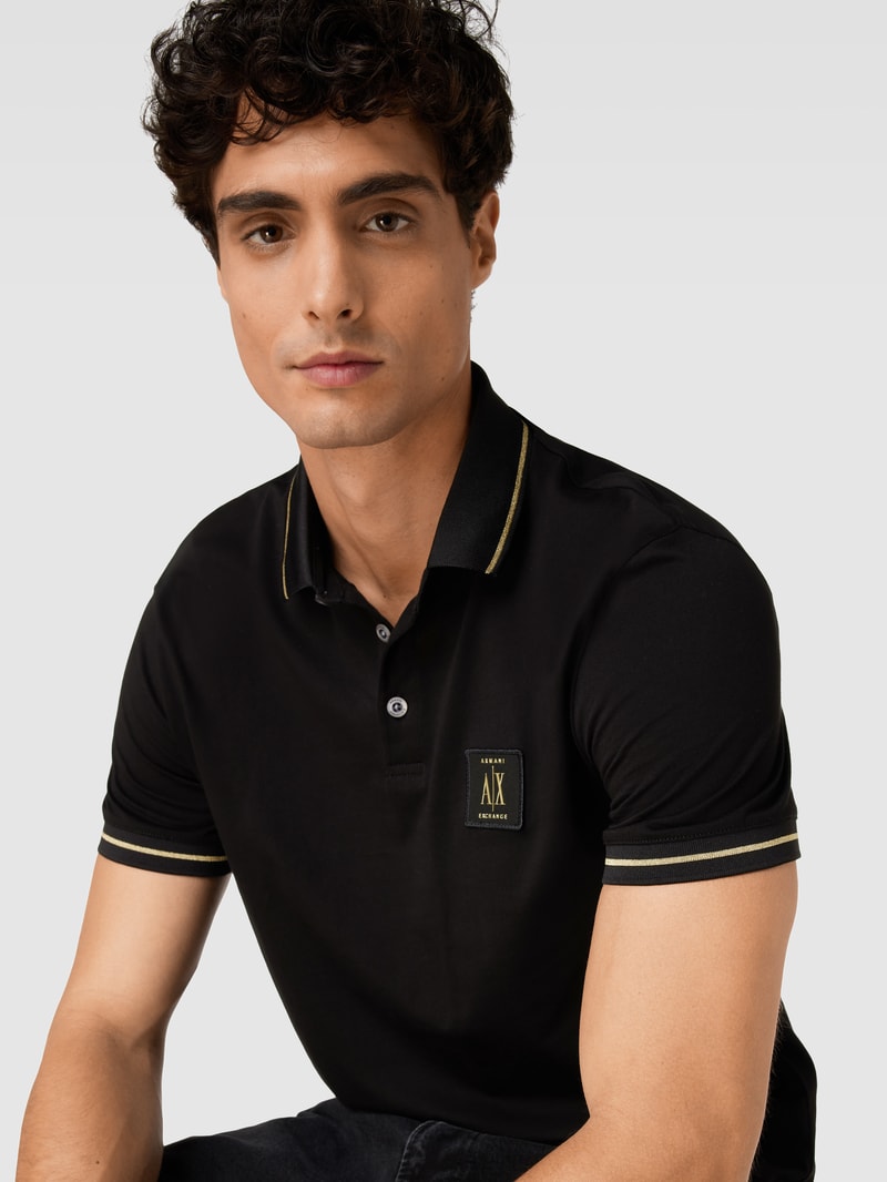 Poloshirt mit Label-Patch in schwarz