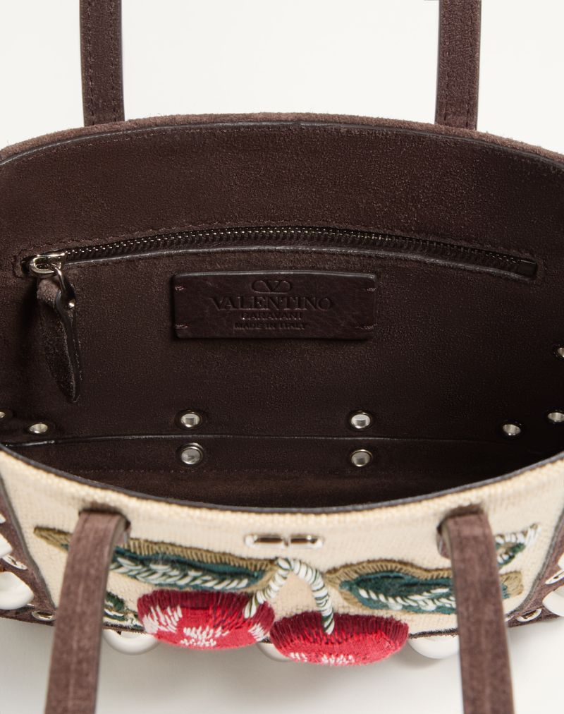 Bolsa de compras mini Valentino Garavani Nellcôte bordada com motivo de cereja.