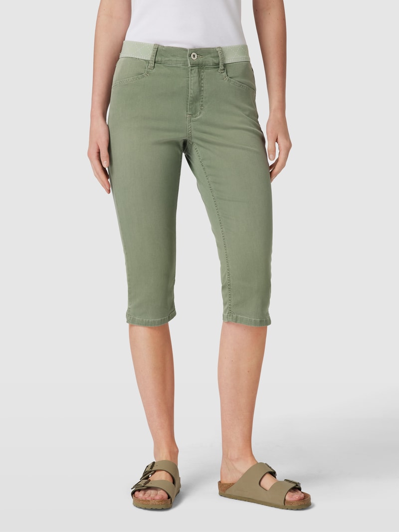 Caprijeans mit Eingrifftaschen in olivgrün