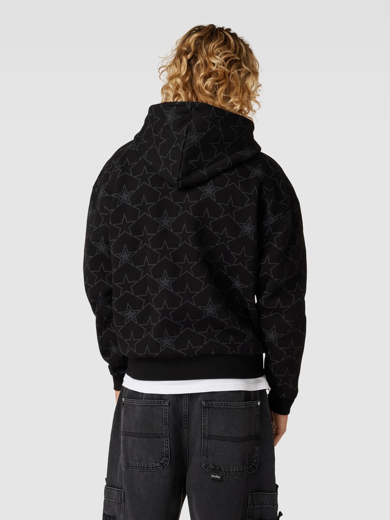 Sweatjacke mit Allover-Print in schwarz