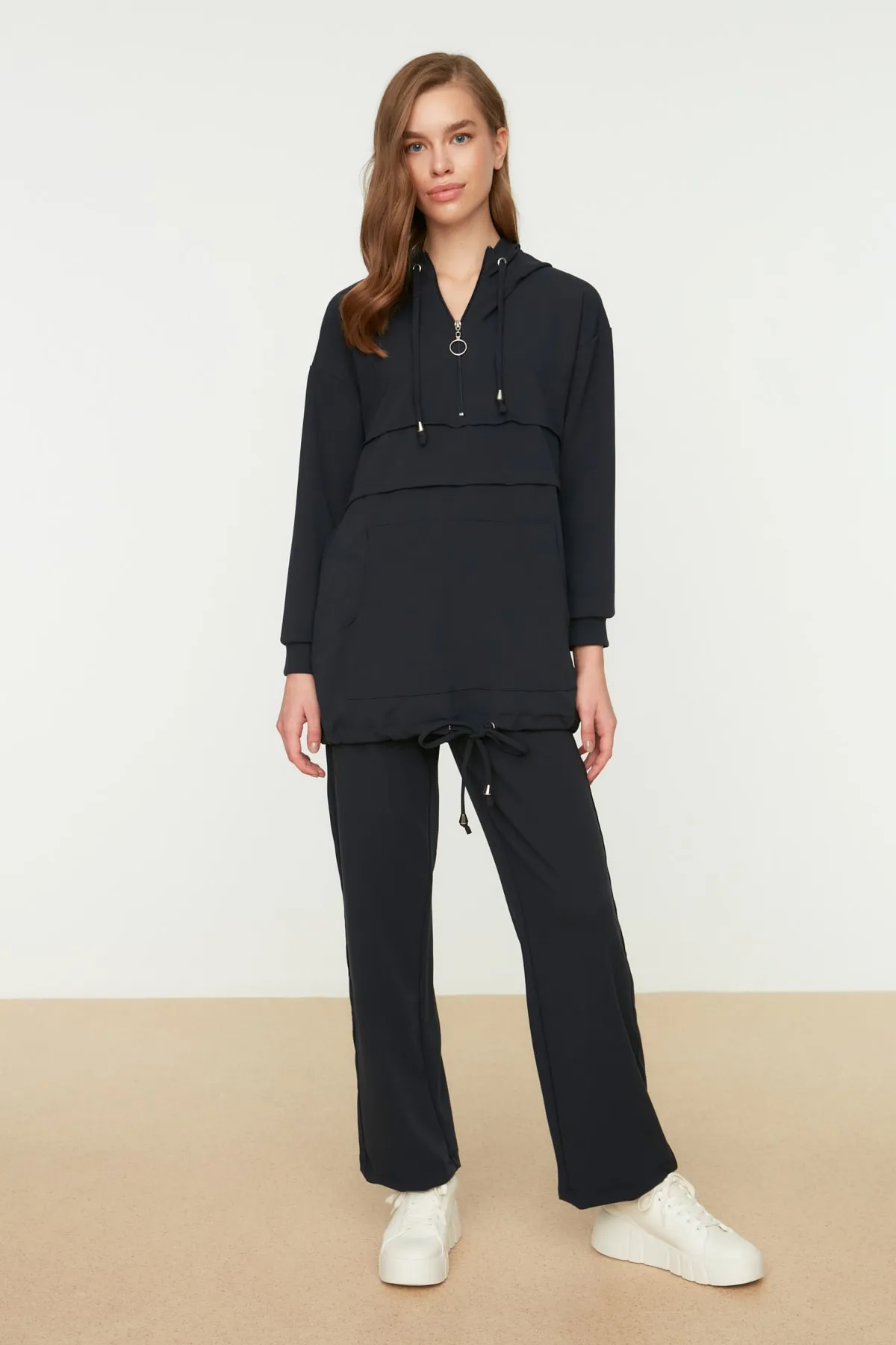 Trendyol Modest  Indigoblaues Strickset aus Tunika und Hose mit Kapuze und Reißverschluss TCTAW22US0094
