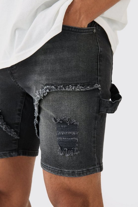 Schwarze Skinny Stretch Jeansshorts mit Rissen