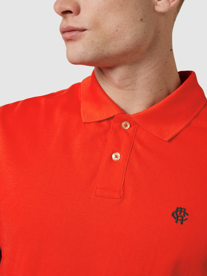 Poloshirt mit Logo-Stitching in rot
