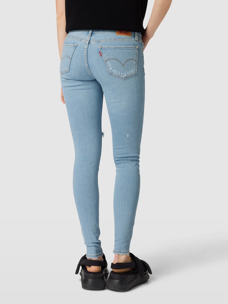 Super Skinny Fit Jeans mit Destroyed-Details Modell '710' in hellblau
