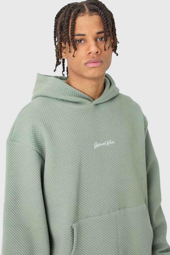 Kastiger Oversize Hoodie mit Stickerei