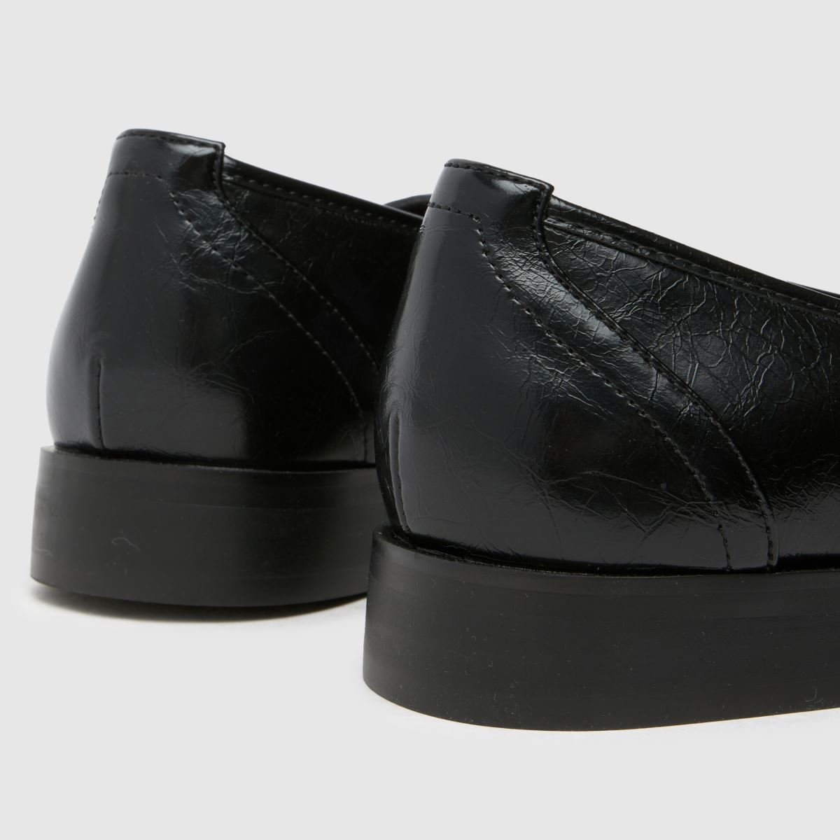 Schuh Lonnie láncos mokaszin lapos cipő fekete színben
