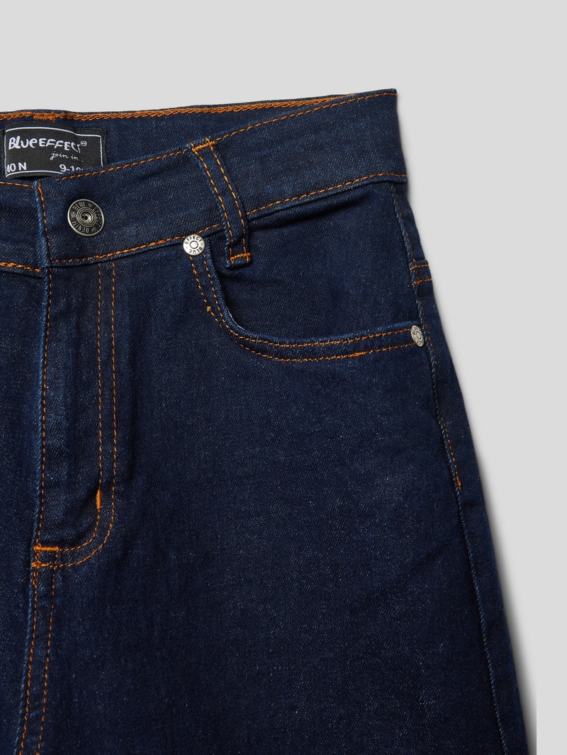 Jeans mit Teilungsnähten und Eingrifftaschen in dunkelblau