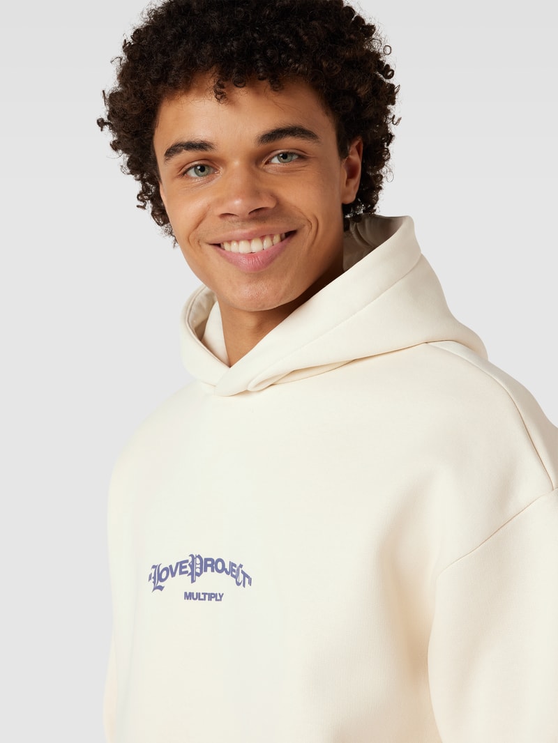 Oversized Hoodie mit Statement-Print in beige