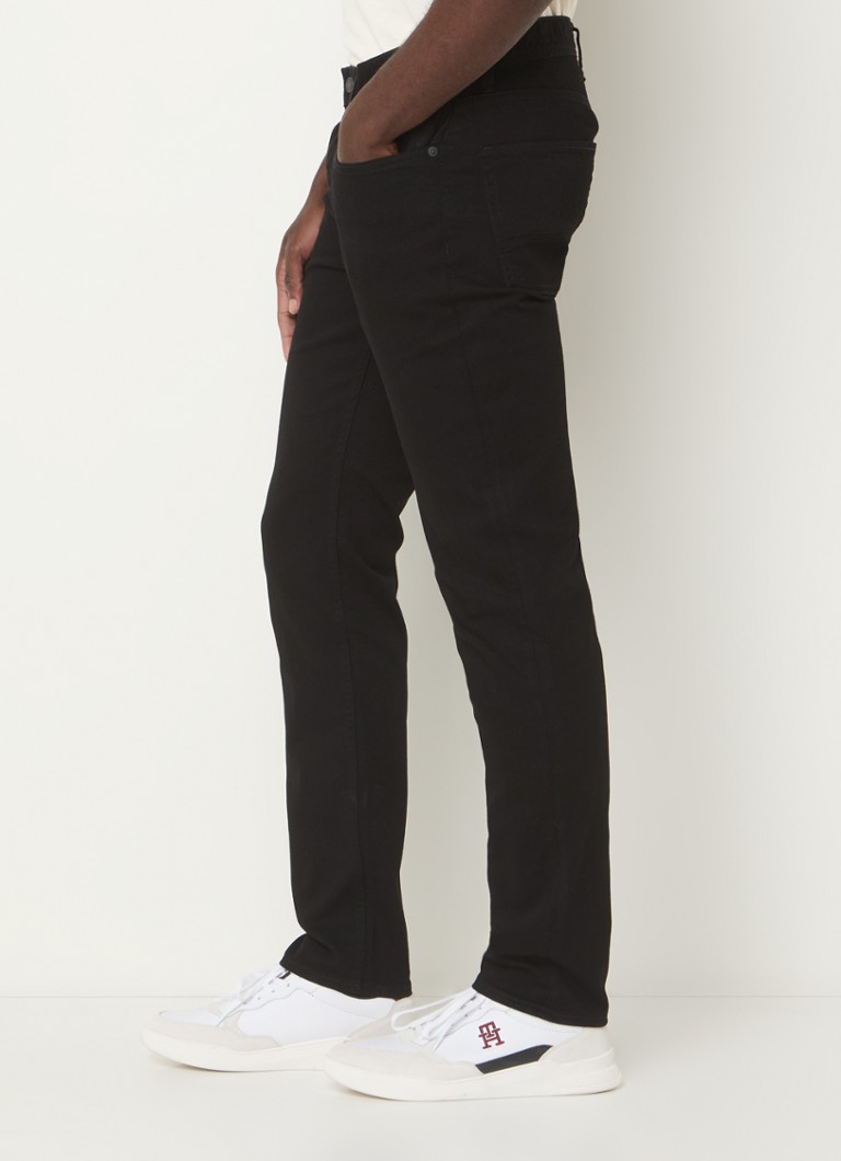 Calça jeans Tommy Hilfiger Core slim fit com lavagem colorida e bolsos laterais.