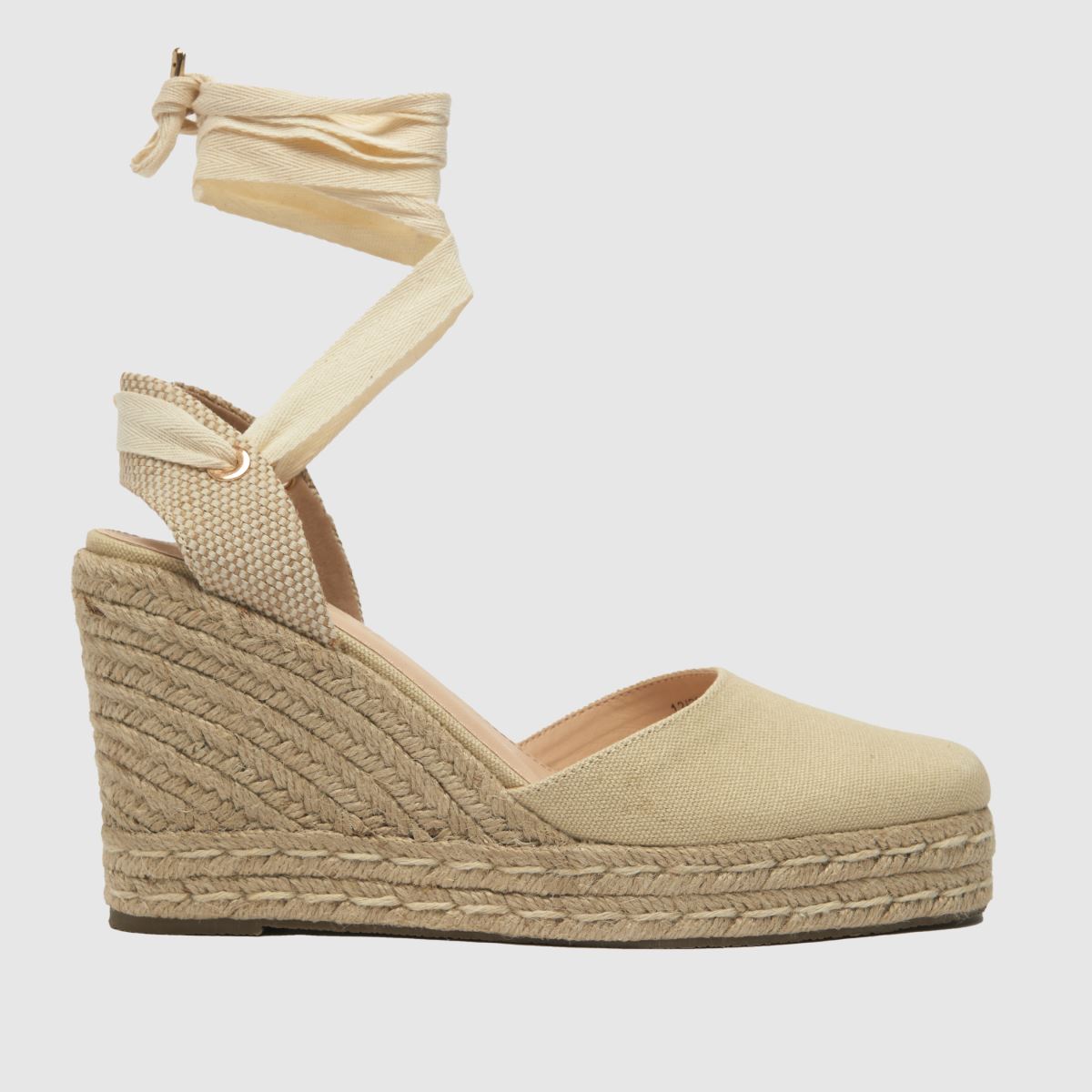 Schuh Venus – Naturfärgade sandaler med kilklack och knytband