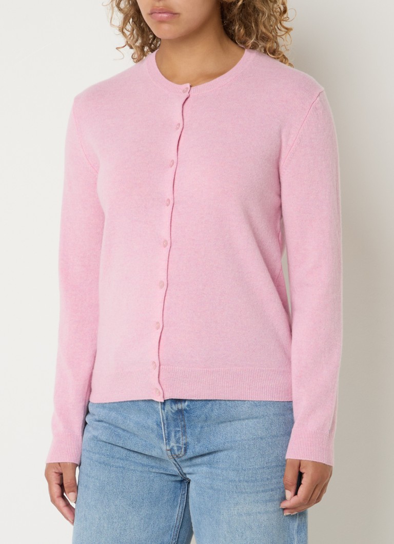 Cardigan Benetton cu guler rotund, confecționat din lână fină.