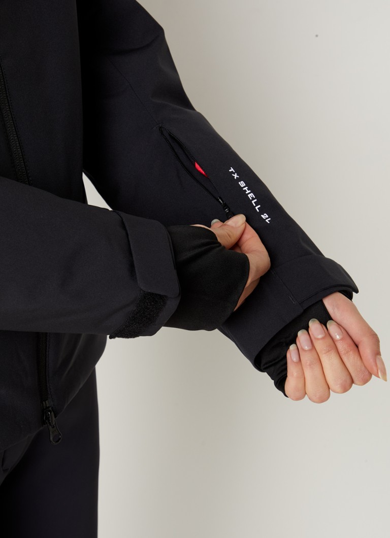 Jachetă de schi softshell J.Lindeberg Starling cu buzunare cu fermoar și logo.