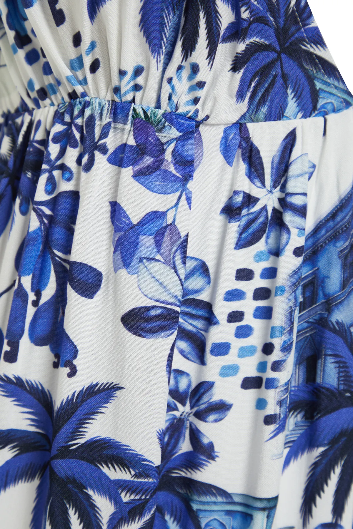 Trendyol Collection  Rückenfreies Maxi-Strandkleid aus Webstoff mit tropischem Muster TBESS24EL00009