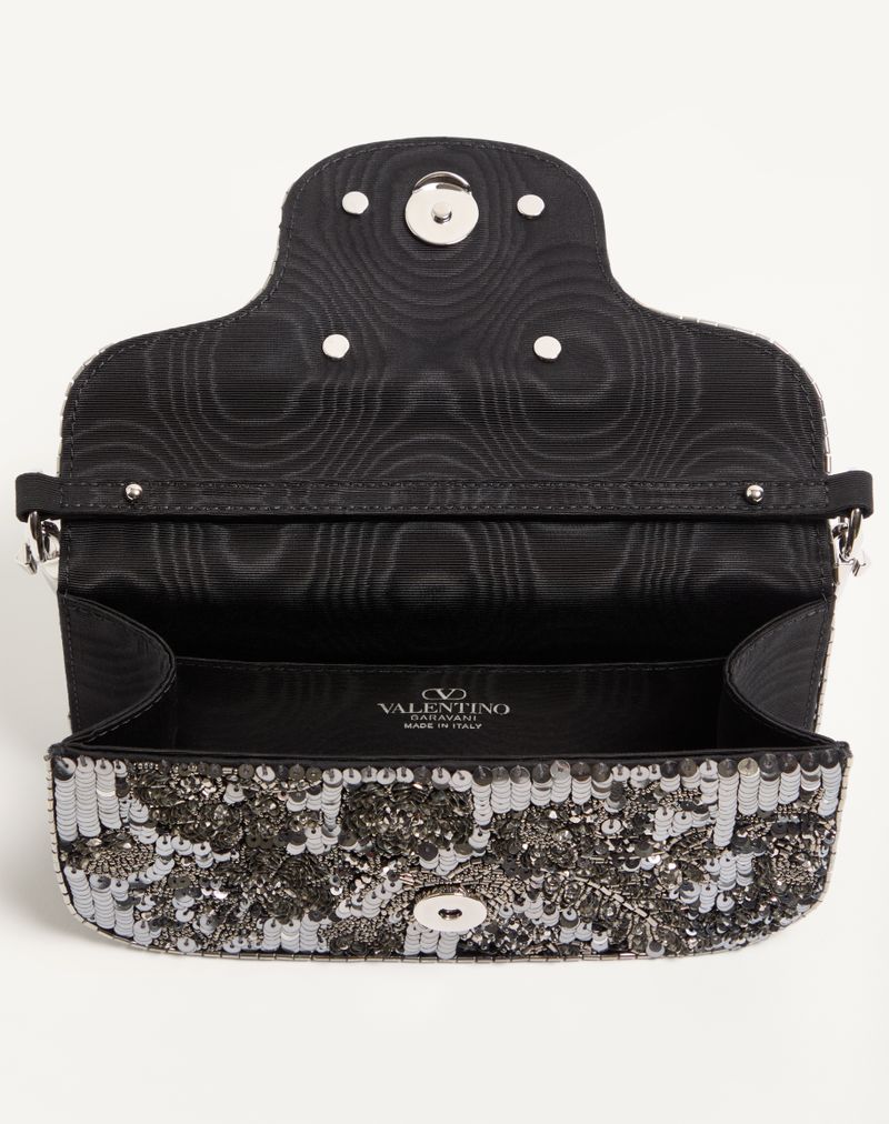Bolsa de ombro pequena Valentino Garavani Locò bordada com logotipo de joia