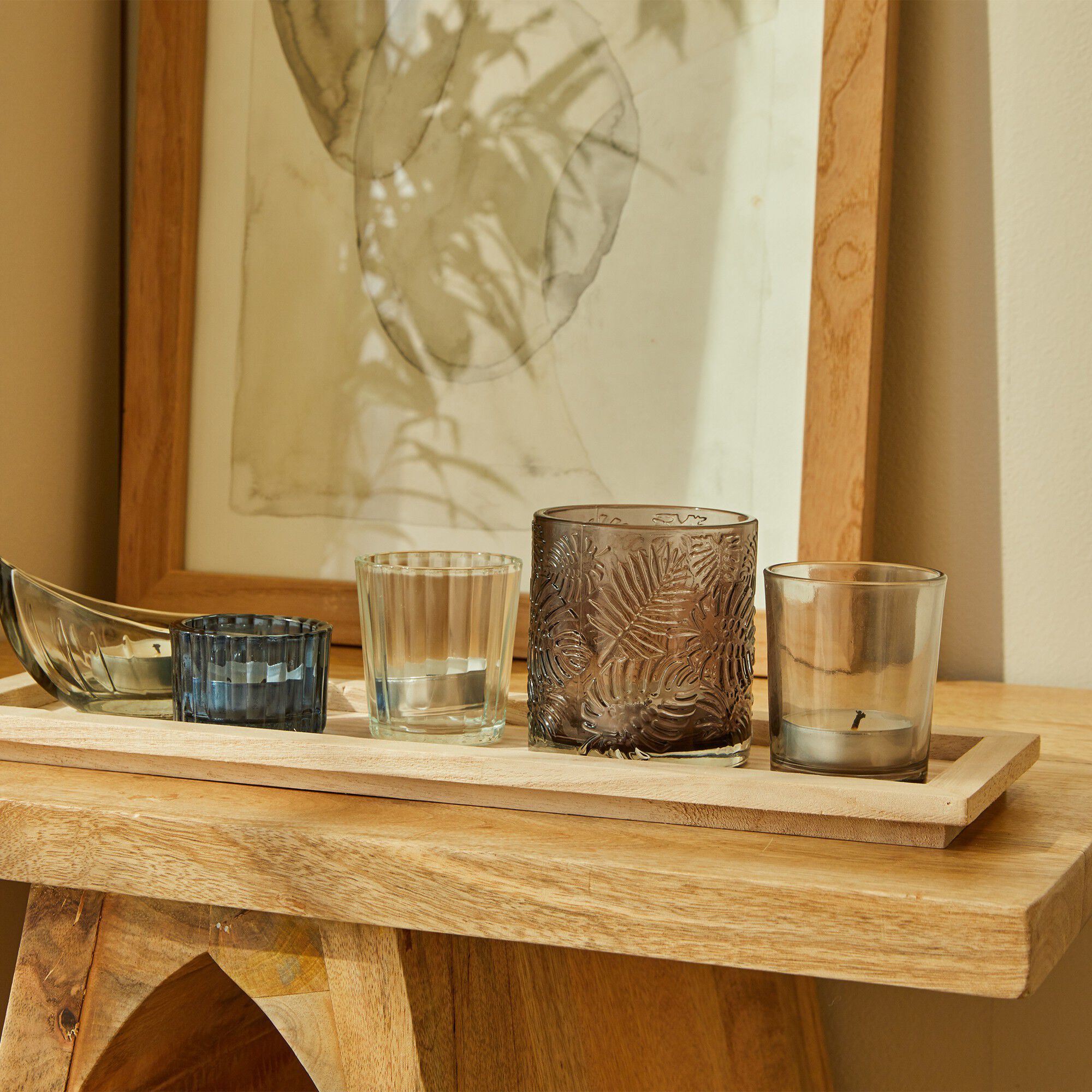 Plateau et photophores en verre.