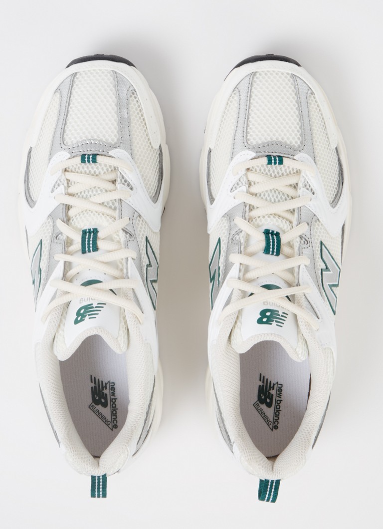 Buty sportowe New Balance 530 z siateczki ze skórzanymi detalami.