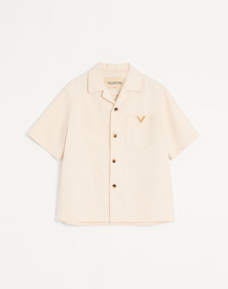 Camisa de boliche Valentino em jeans com detalhes dourados