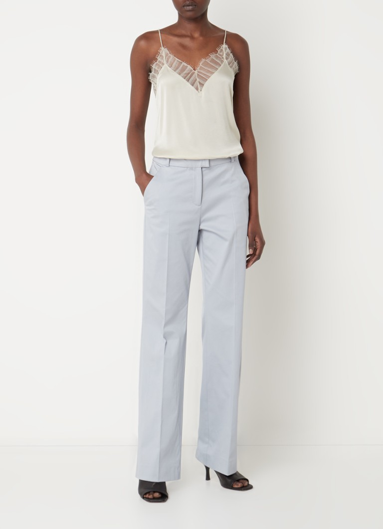 Pantaloni John cu talie înaltă și croială dreaptă de la ba&sh, confecționați dintr-un amestec de lyocell, cu buzunare laterale.