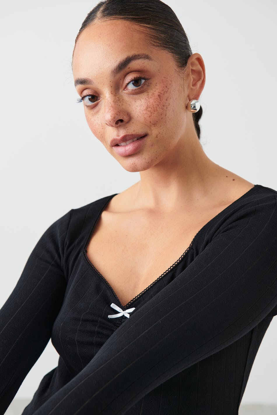 Pointelle bow top