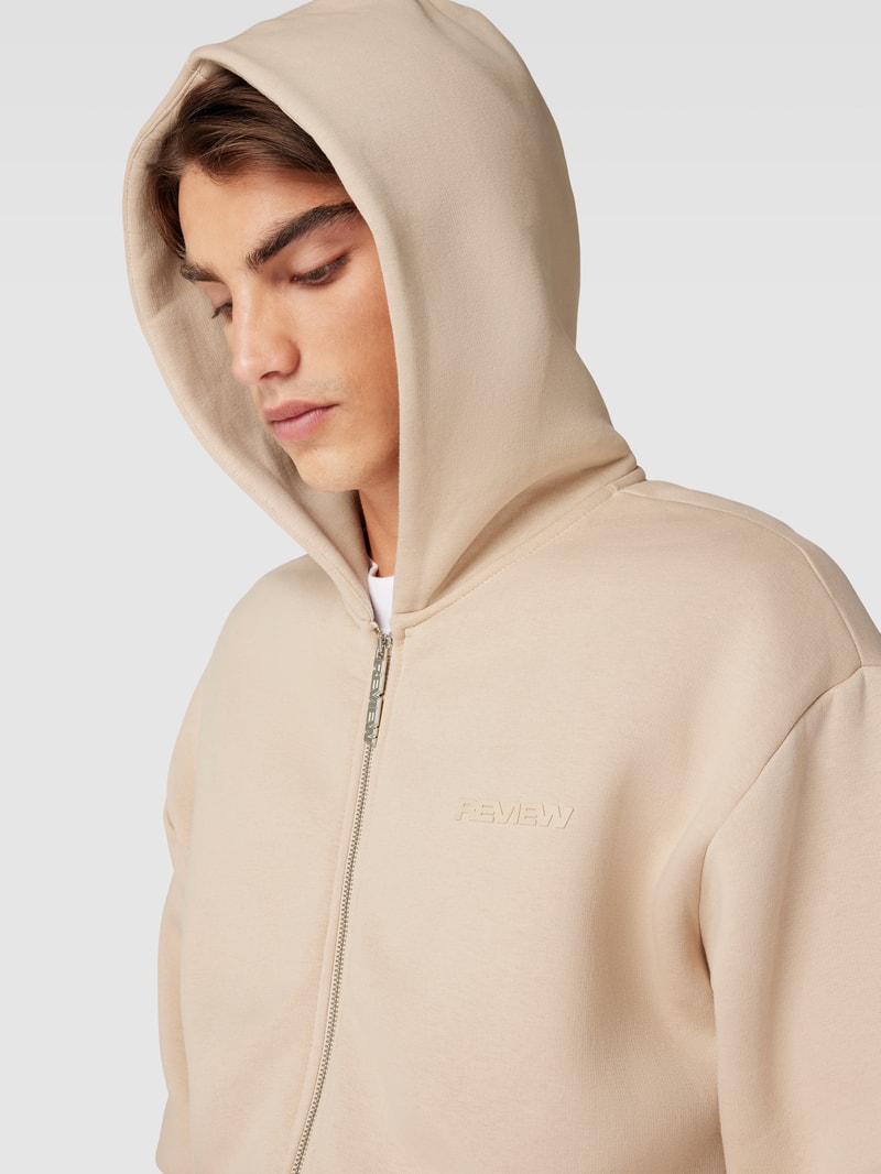 Sweatjacke mit Kapuze in taupe