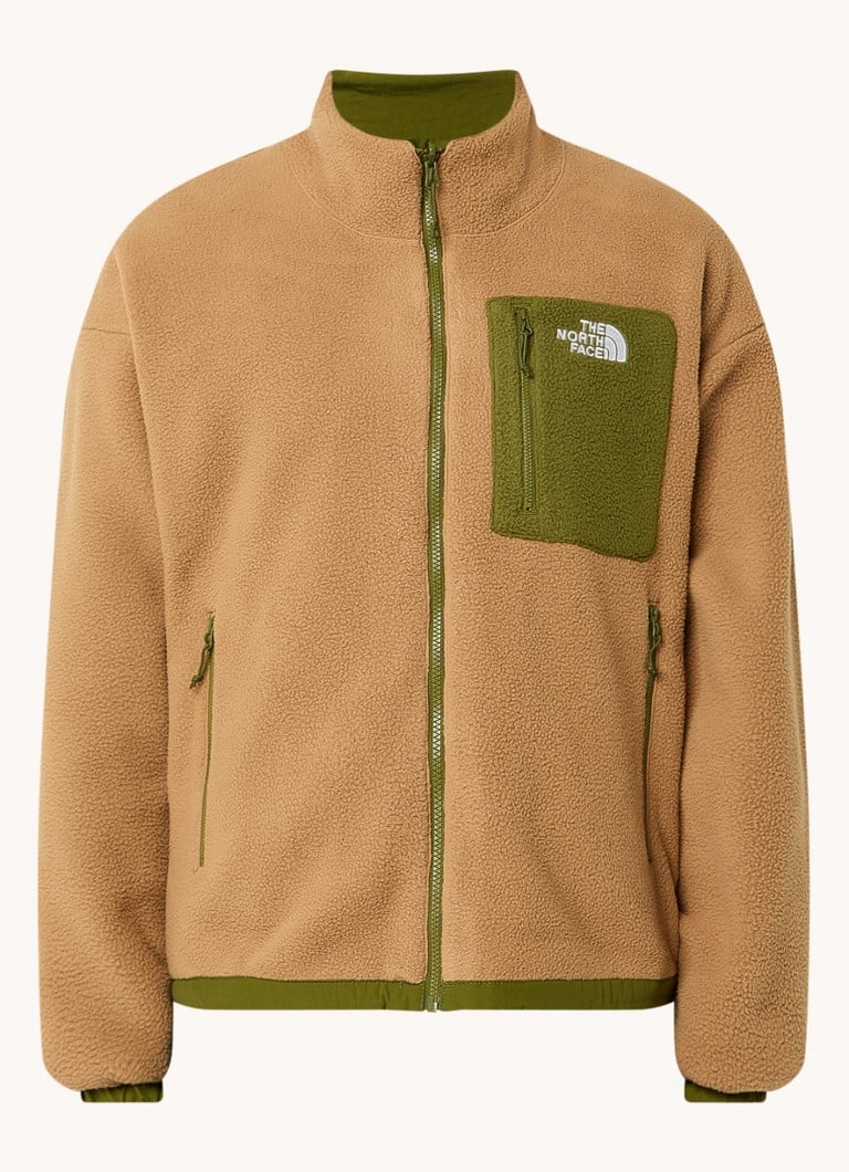 Reverzibilna jakna The North Face Yumiori s džepovima na patentni zatvarač i vezom logotipa