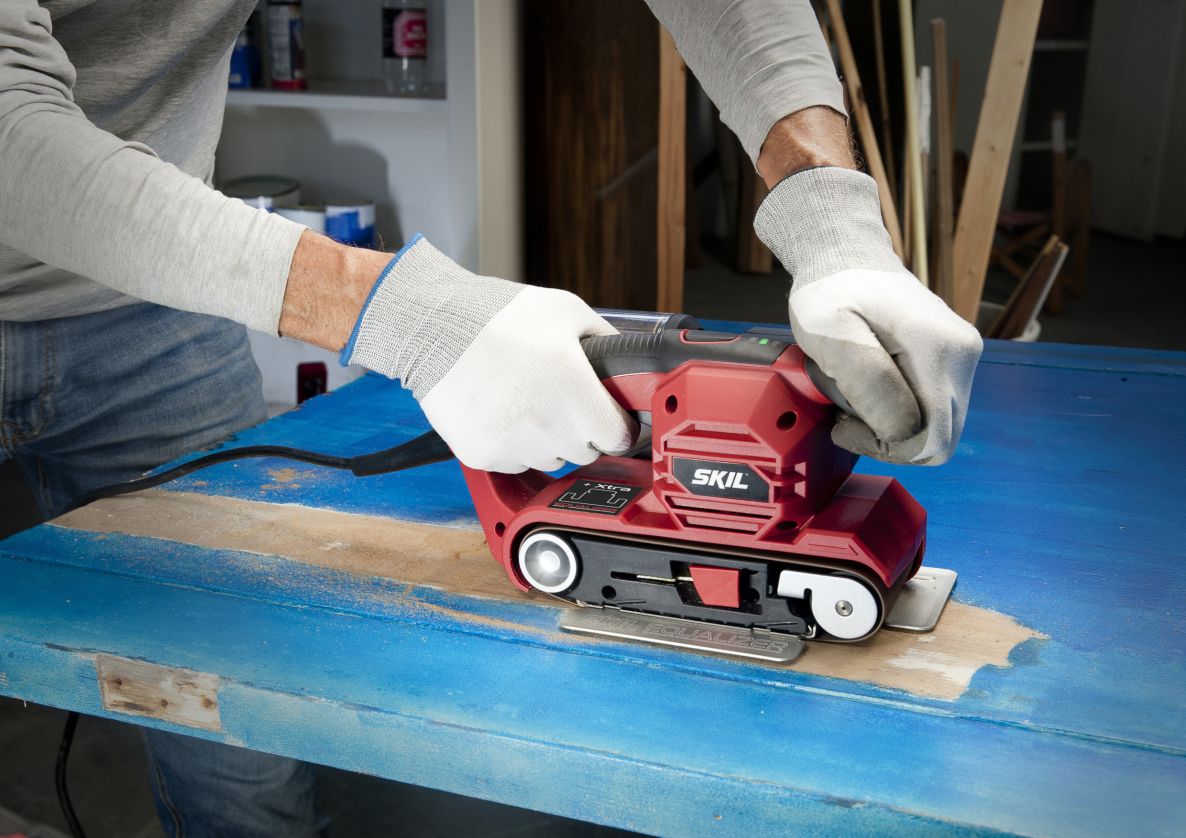 SKIL SR1E7615AB Cuțit cu bandă 76 mm x 457 mm 710 W + spațiu pentru cuțit