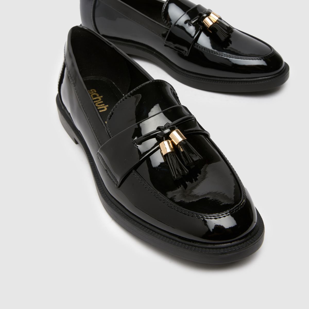 Schuh Lohan lakk bojtos mokaszin lapos cipő fekete színben