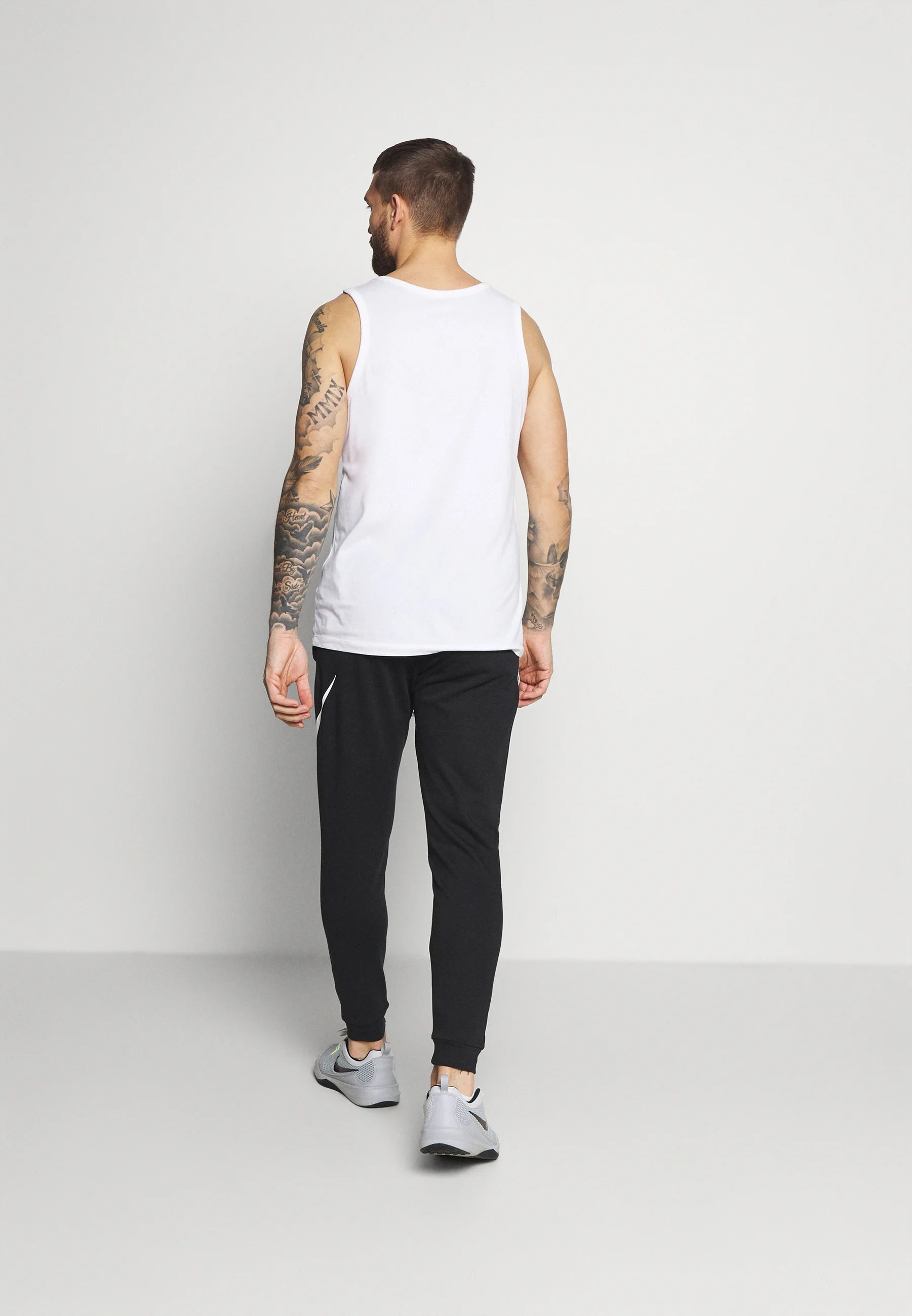 Nike Performance DRY TAPER - Pantalón deportivo