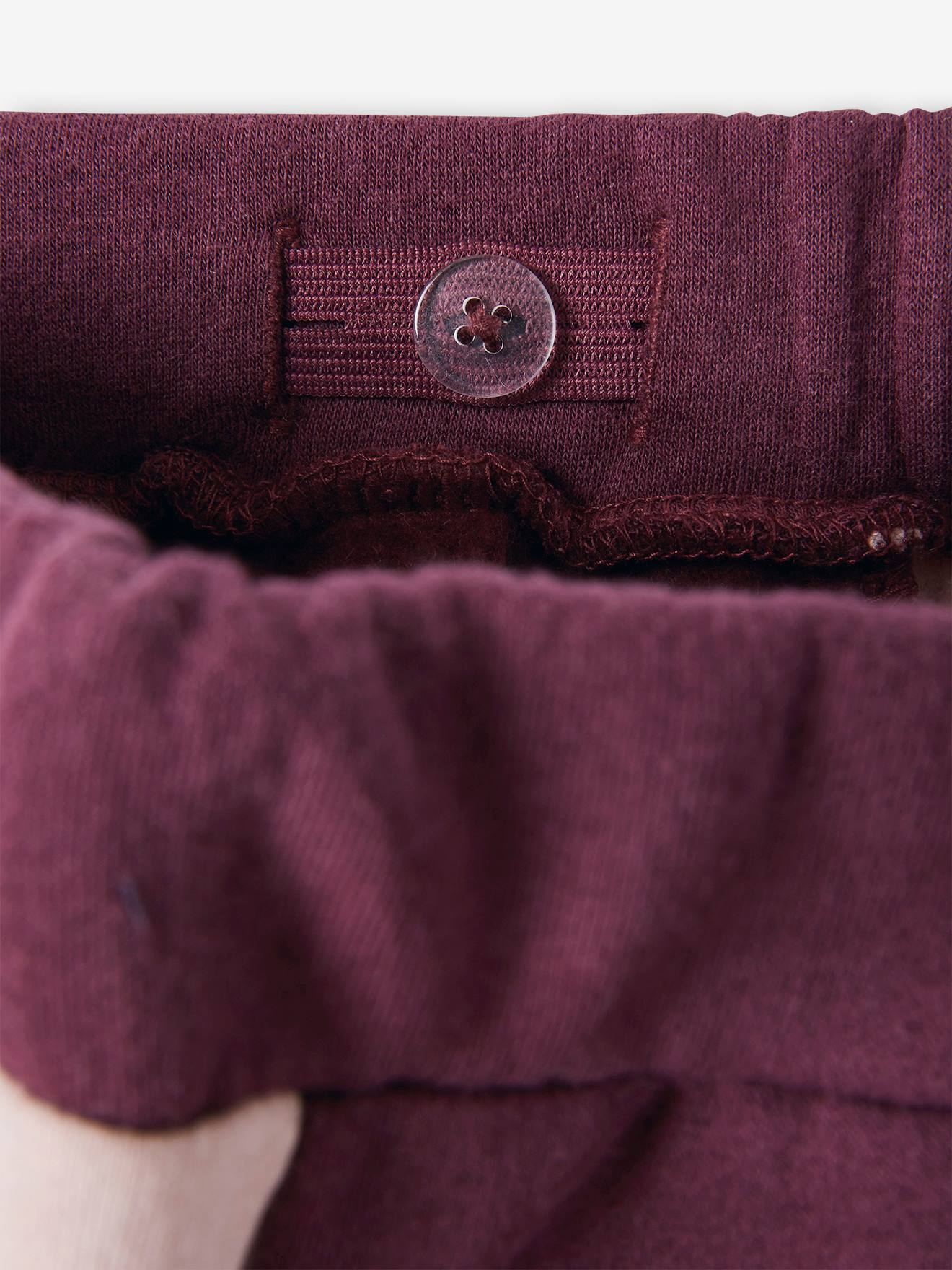 Pantalon de sport fille en molleton bandes côtés prune