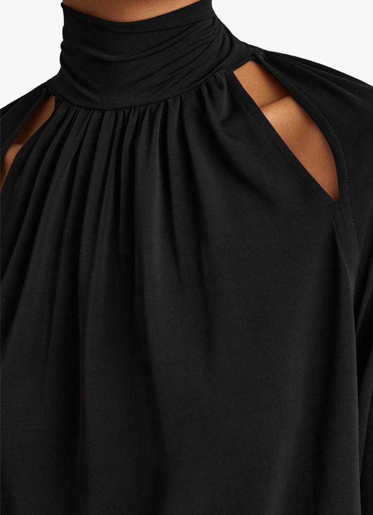 Top Reiss Adrienne con collo alto e dettagli traforati.