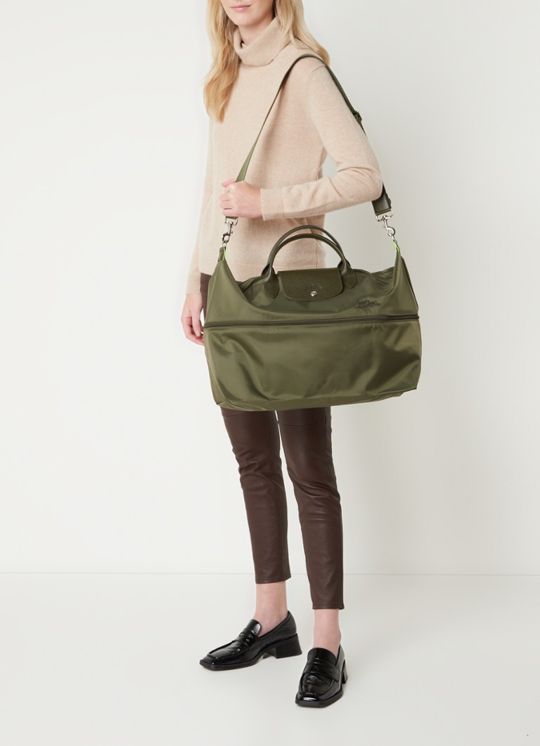 Geantă de voiaj extensibilă Longchamp Le Pliage, verde, cu detalii din piele.