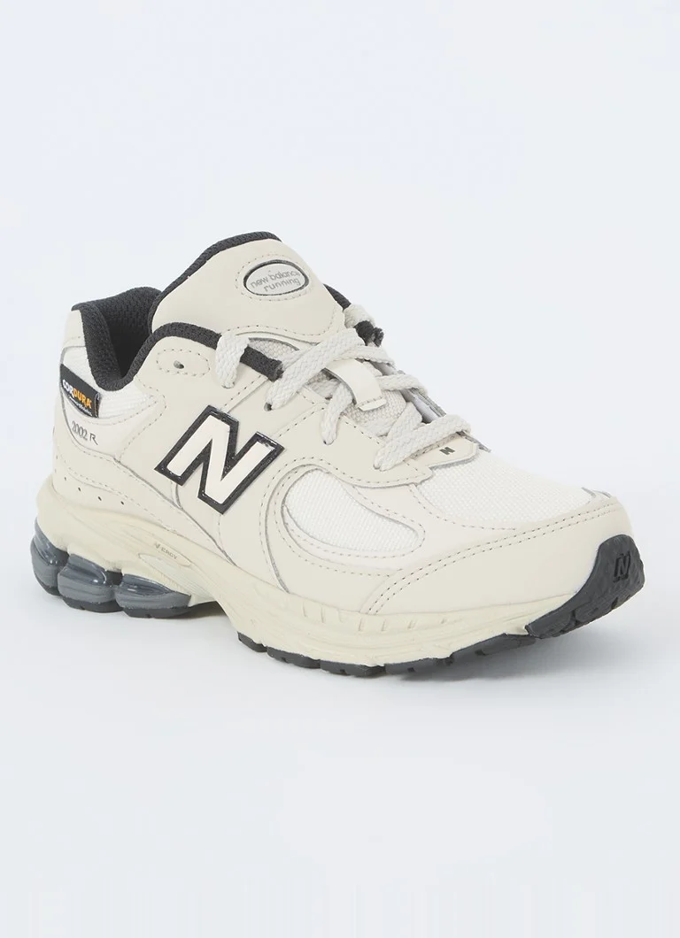 New Balance 2002 -lenkkarit verkko- ja nahkayksityiskohdilla