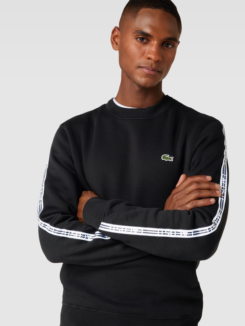 Sweatshirt mit Rundhalsausschnitt Modell 'TAPE CREW' in schwarz