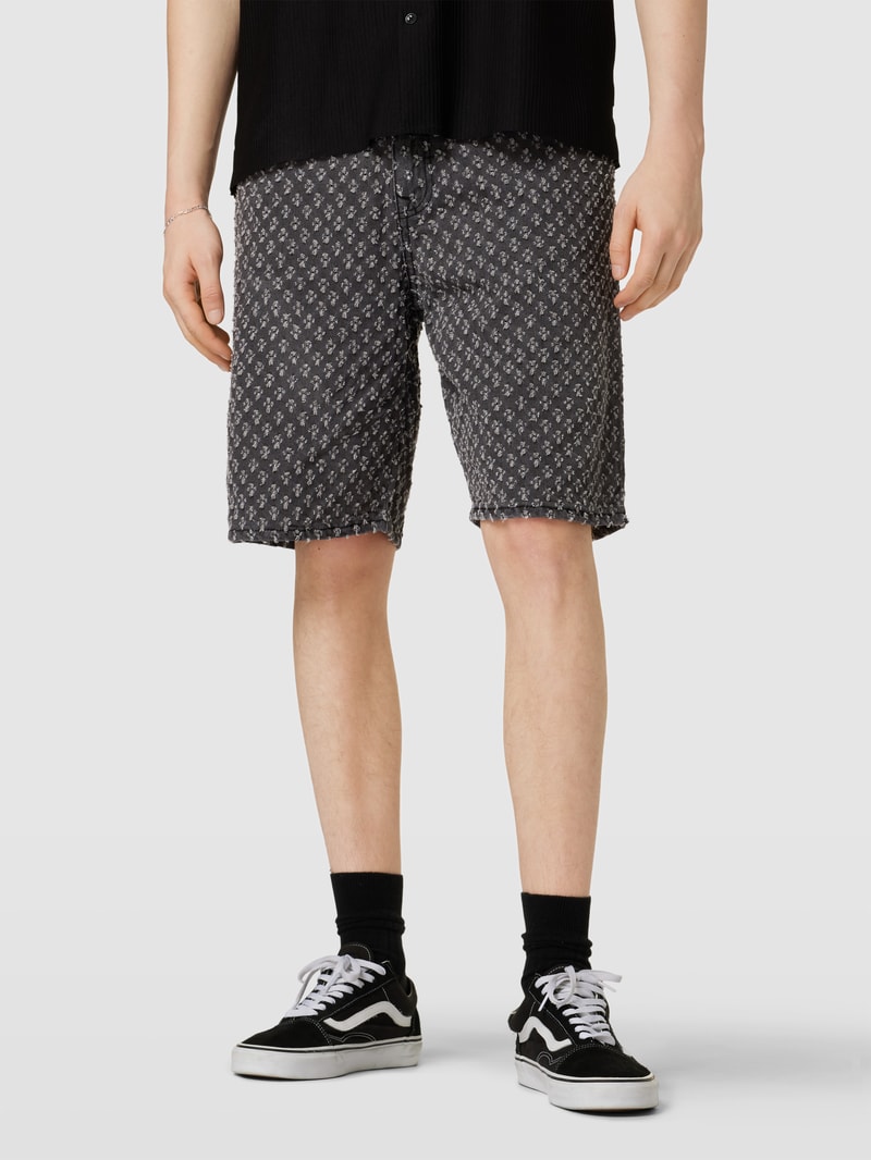 Shorts mit Allover-Muster in schwarz