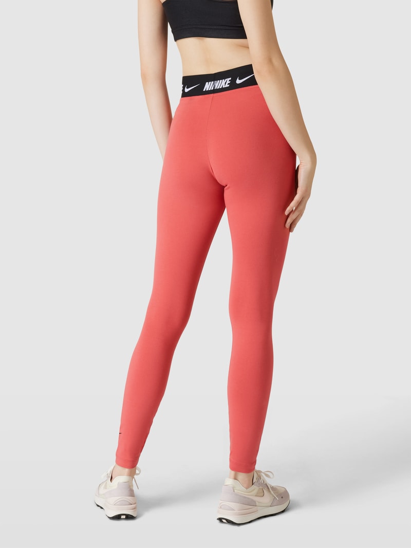 Leggings in unifarbenem Design mit Logo-Detail in rostrot