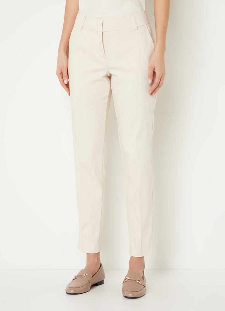 Pantaloni de vară cu talie medie, croială mulată și buzunare laterale.