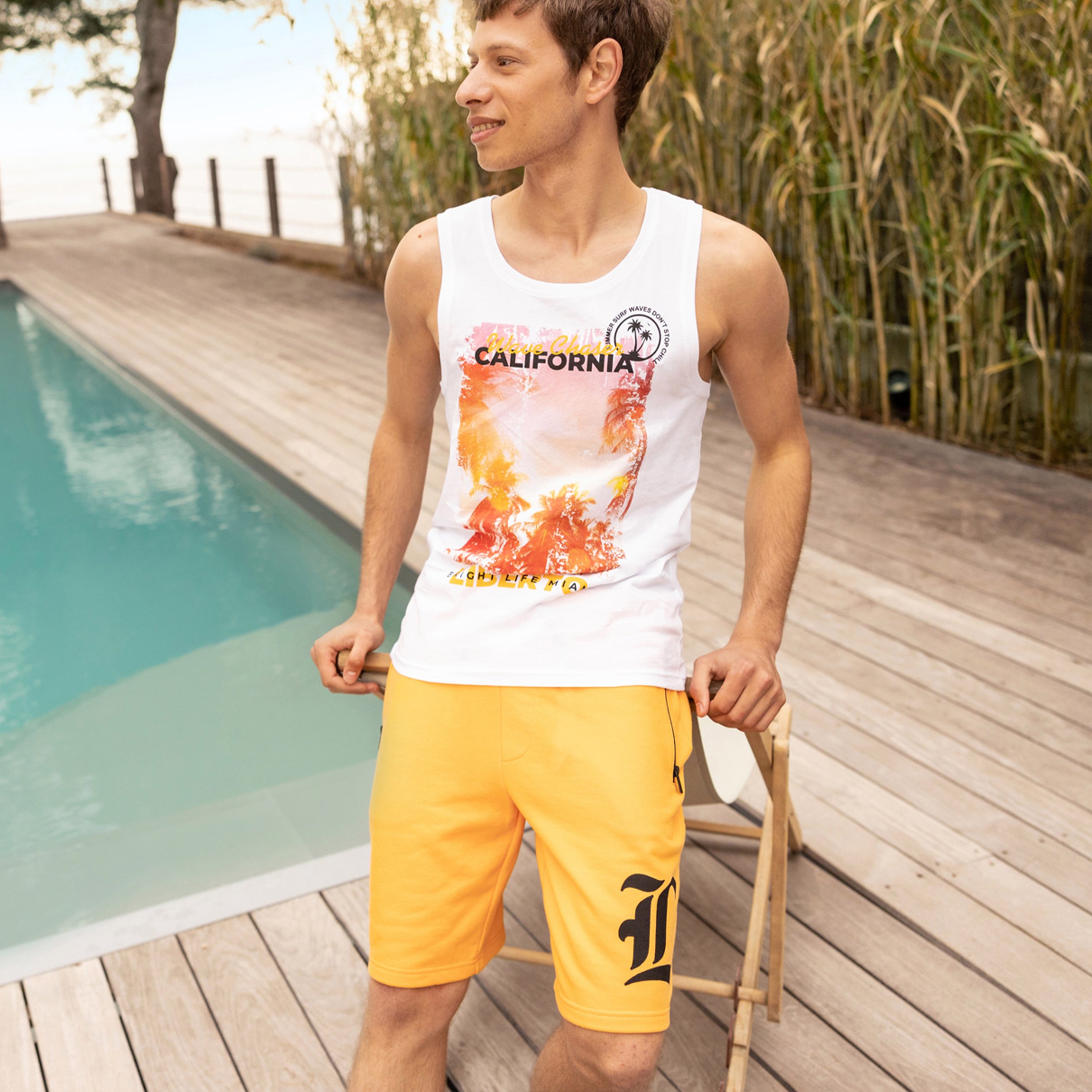 Jogging-Short droit avec poches orange homme | La Halle