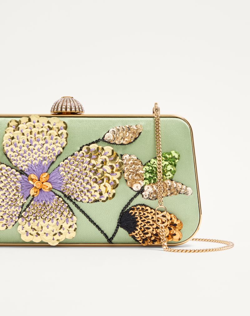 Bolsa Valentino Garavani Carry Secrets em cetim com bordado floral