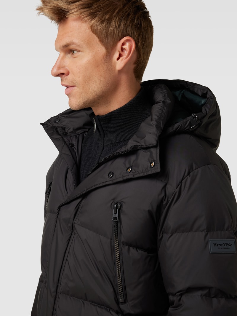 Daunenjacke in Stepp-Optik mit Pattentaschen in schwarz