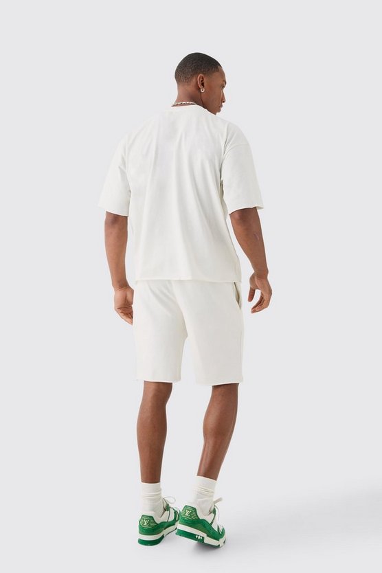 Kastiges Oversize T-Shirt mit rohem Saum und Homme-Print & Shorts