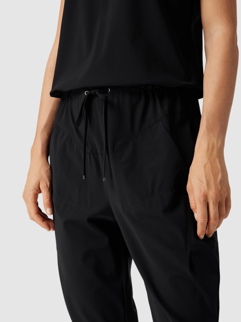 Jumpsuit mit seitlichen Eingrifftaschen Modell GIRA JUMPY in schwarz
