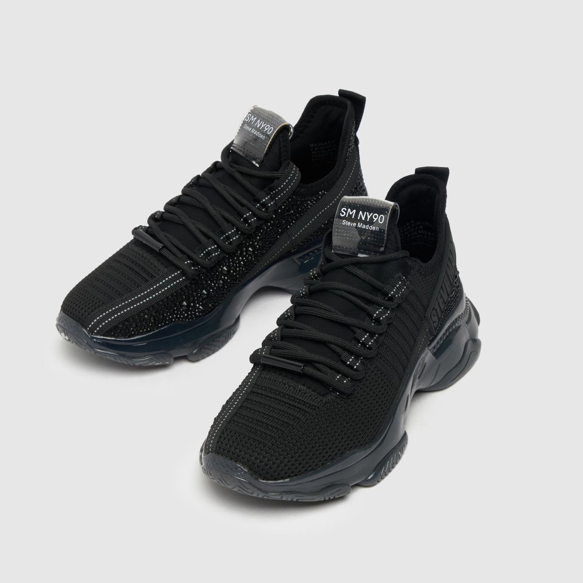 Steve Madden – Svarta sneakers med överkängsmönster